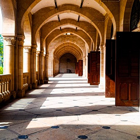 Hallway at an Indian university with doors open